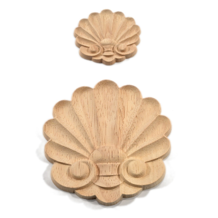 Houten ornamenten met schelpmotief van St. James