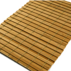 Le mur de bambou brun foncé lié par un fil
