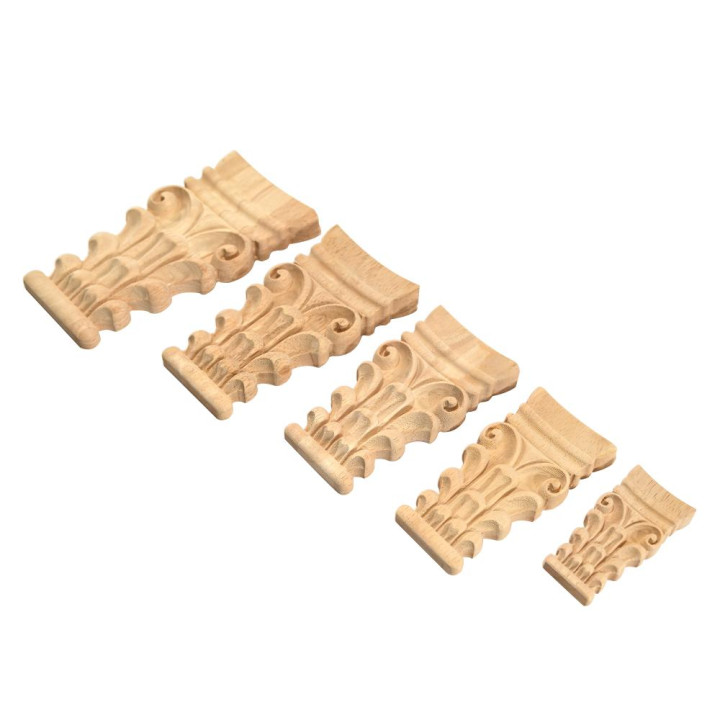 Ornamentos tallados para muebles: capitel jónico y columna griega