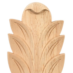 Eksoottisesta puusta valmistettu koristeluun tarkoitettu lehtipäällyslista