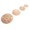 Wood appliques with floral motifs in multiple sizes