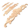 Carved wooden ornaments in multiple sizes