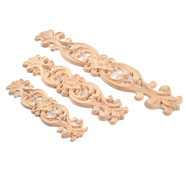 Adornos para muebles tallados en madera exótica natural.