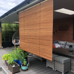 The BC30 is an oiled bamboo roller blinds uk for patio shading.