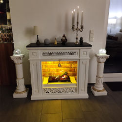 Display fireplace, using wooden carvings.